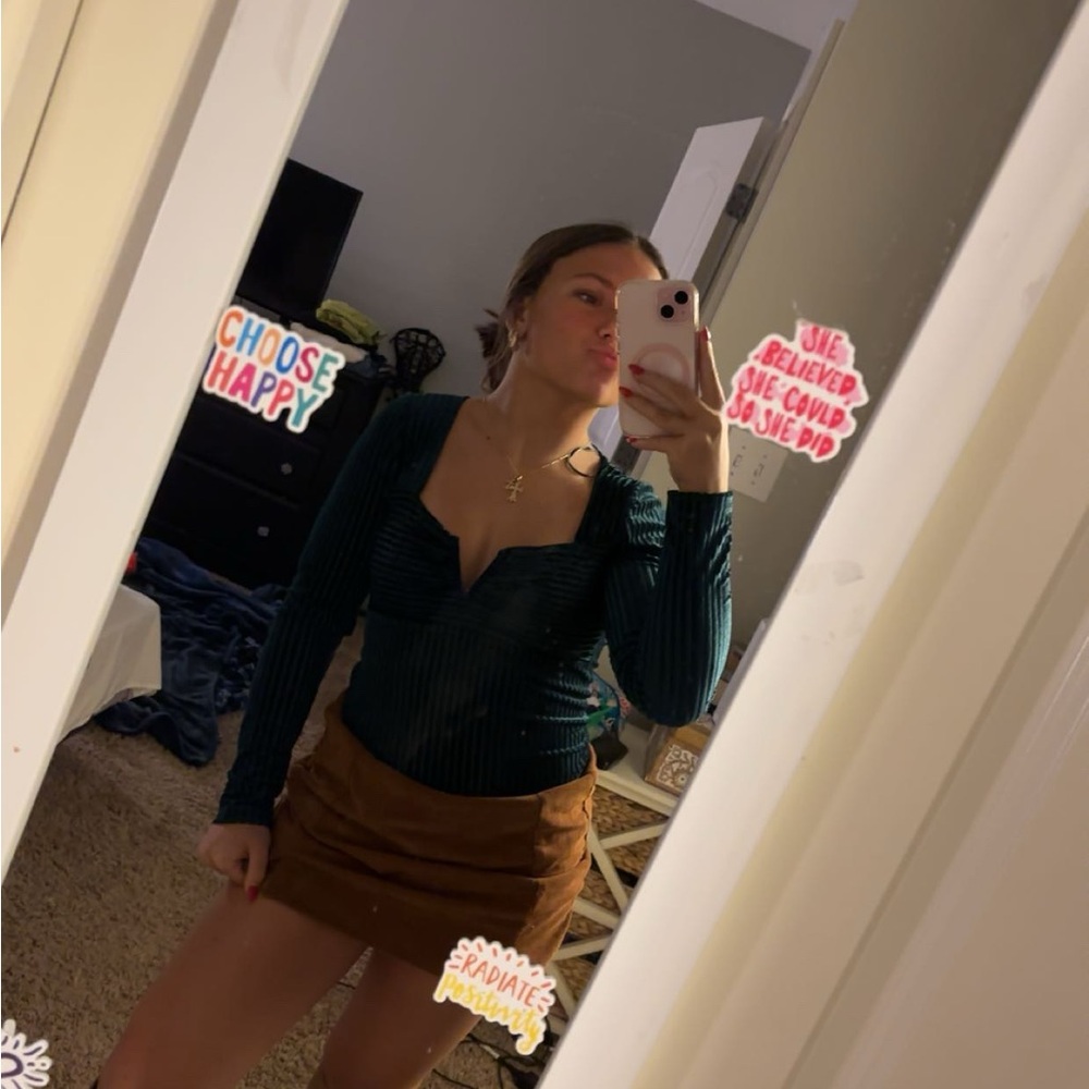 Francesca’s XS green body suit 
worn once